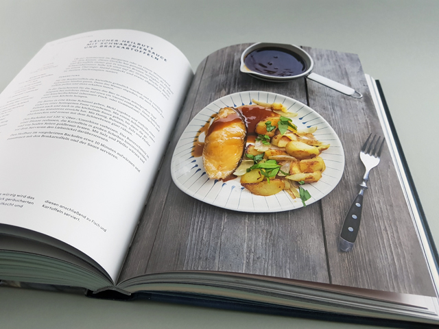 Das Fischräucherbuch Ulmer Verlag aufgeschlagenes Kochbuch